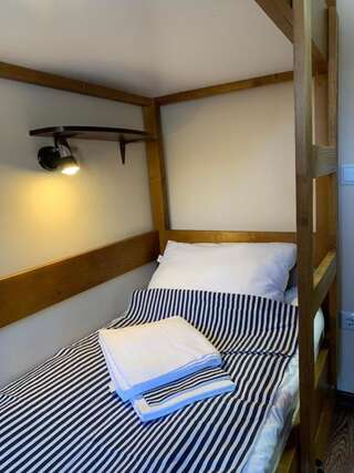 Хостелы Hostel Gulliver Ужгород Односпальная кровать в общем номере-5