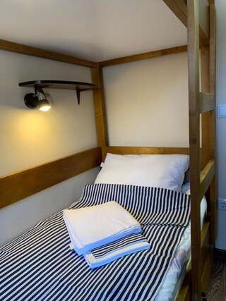 Хостелы Hostel Gulliver Ужгород Односпальная кровать в общем номере-1